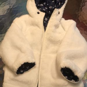 Girls fall reversible jacket by Tommy Hilfiger.